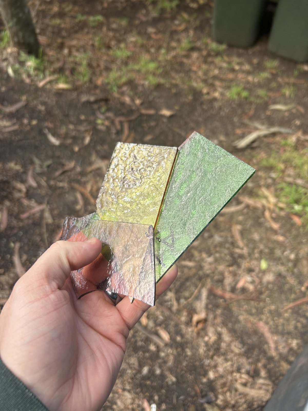 A scored-and-snapped leadlight panel up close — clean, chip-free edges where each piece was cut to fit
